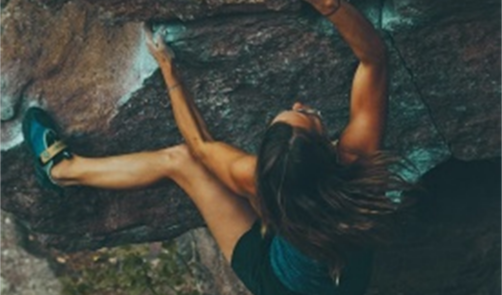 woman rock climber